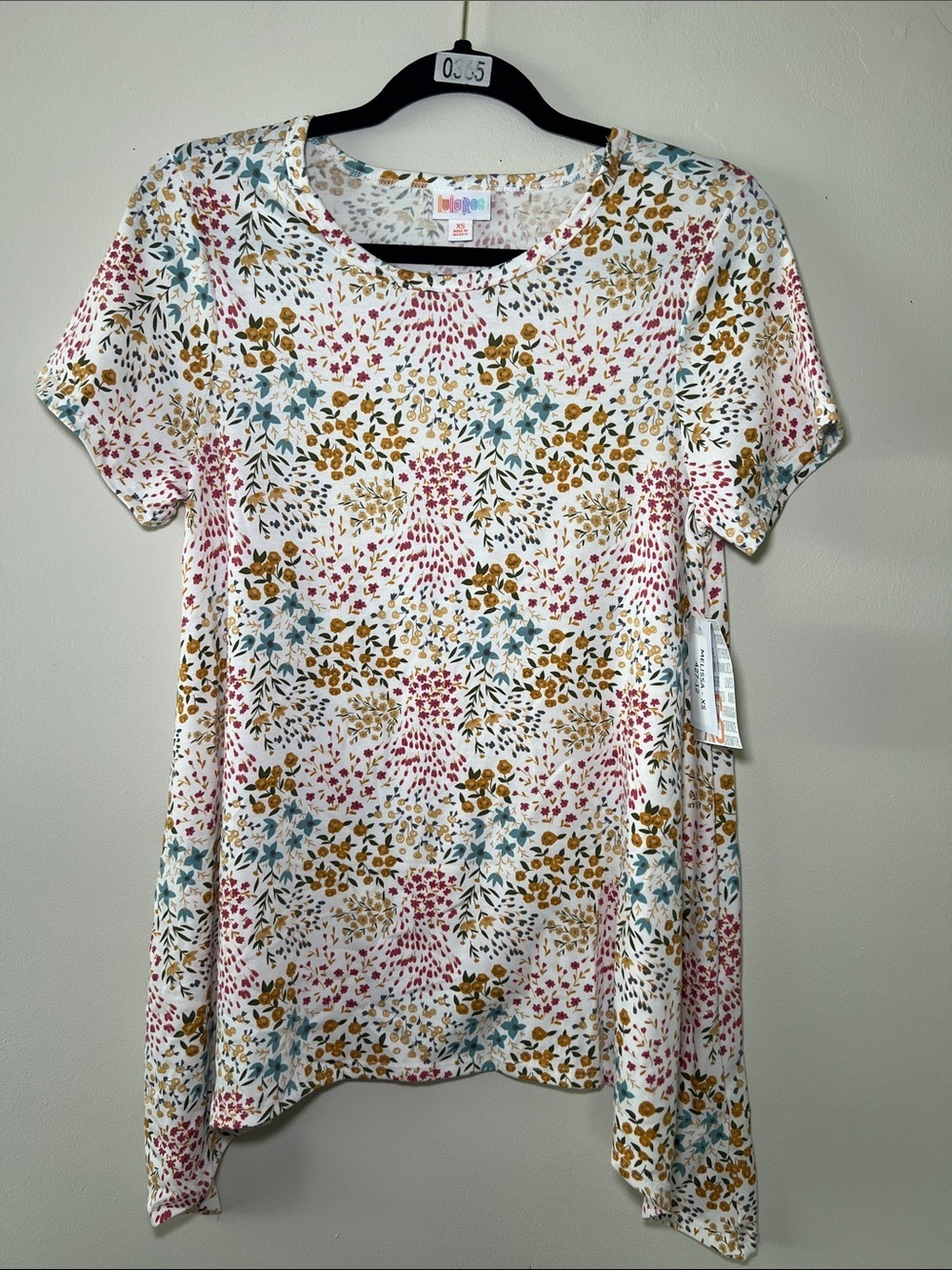 LuLaRoe Melissa White Floral Short Sleeve Top with Pink, Teal & Mustard Print - Picture 1 of 4